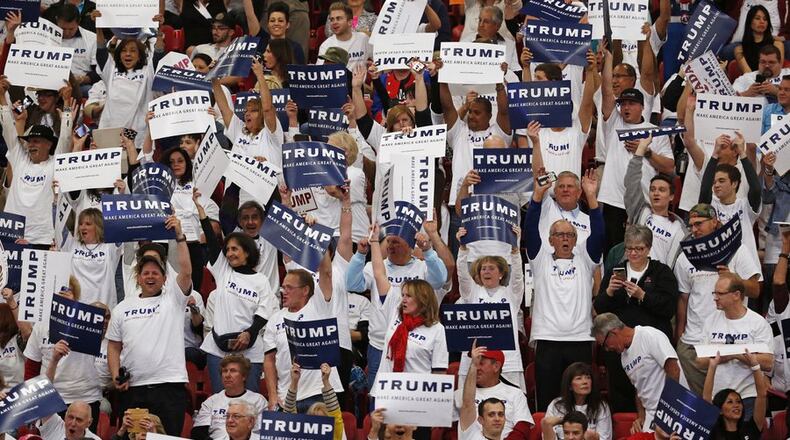 Supporters of Republican presidential candidate Donald Trump cheer before campaign rally Monday, Feb. 22, 2016, in Las Vegas. (AP Photo/John Locher)