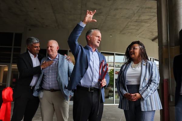 CEO Jason Hoff (center) speaks with U.S. Rep. Nikema Williams following a ribbon cutting ceremony at Mercedes-Benz’s new research and development campus on Wednesday, July 8, 2026, in Atlanta. (Arvin Temkar/AJC)