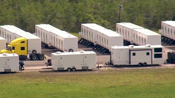 This image grab from video shows activity at an immigration detention facility dubbed “Alligator Alcatraz” located at an isolated Everglades airfield. (WSVN via AP)