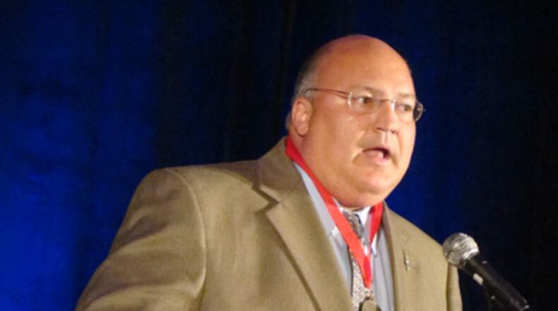 Kirk Mellish in 2010 when he was inducted into the Georgia Radio Hall of Fame. RODNEY HO/rho@ajc.com