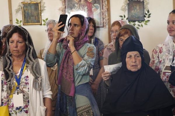 Worshippers fill St. Nicholas Orthodox Church in Kwethluk, Alaska, on June 19, 2025, for the canonization ceremony of Matushka Olga Michael, who became the first female Orthodox saint in North America. (AP Photo/Mark Thiessen)