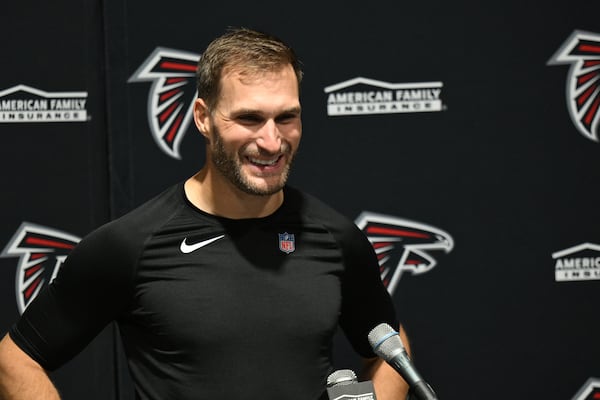 Kirk Cousins rallied the Falcons from a 14-point fourth-quarter deficit to a 29-28 victory over the Bucs on Thursday night. “Just proud of my teammates, my coaches and the effort that everybody put forth to make this happen,” Atlanta’s quarterback says. (Jason Behnken/AP)