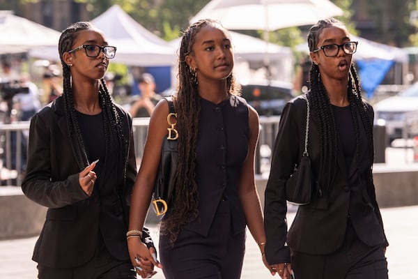 Lila Combs, Chance Combs and Jessie Combs, daughters of Sean Combs, arrive at court on Monday, June 30, 2025, in New York. (AP Photo/Yuki Iwamura)