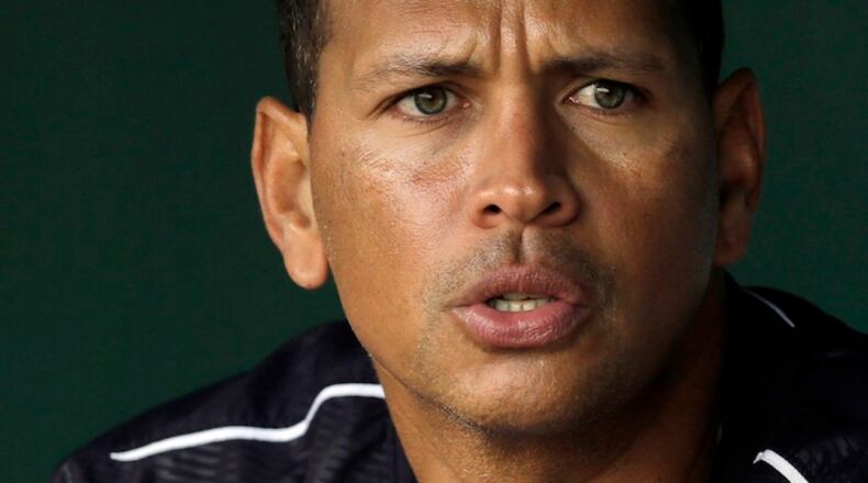 FILE - In this April 15, 2015, file photo, New York Yankees' Alex Rodriguez talks in the dugout before a baseball game against the Baltimore Orioles in Baltimore. Rodriguez has been hired by Fox as a guest analyst for the remainder of the AL Championship Series and the World Series, the network said Sunday, Oct. 18, 2015. (AP Photo/Patrick Semansky, File)