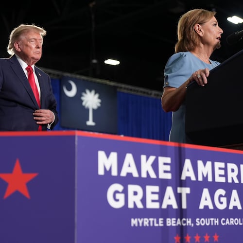 Sen. Darline Graham, R-S.C., speaks as President Donald Trump listens at a campaign rally for Graham at the Myrtle Beach Convention Center in Myrtle Beach, S.C., Friday, Aug. 21, 2026. (AP Photo/Jacquelyn Martin)