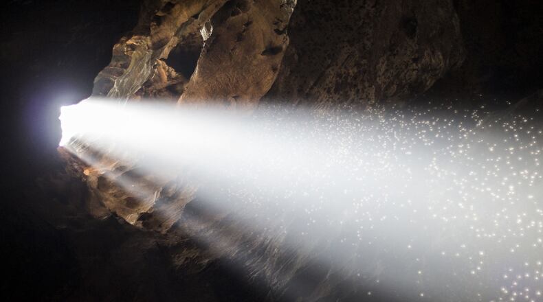 Light filters into a cave, which is not the one in Cleveland, Virginia, where five trapped men were rescued Sunday.