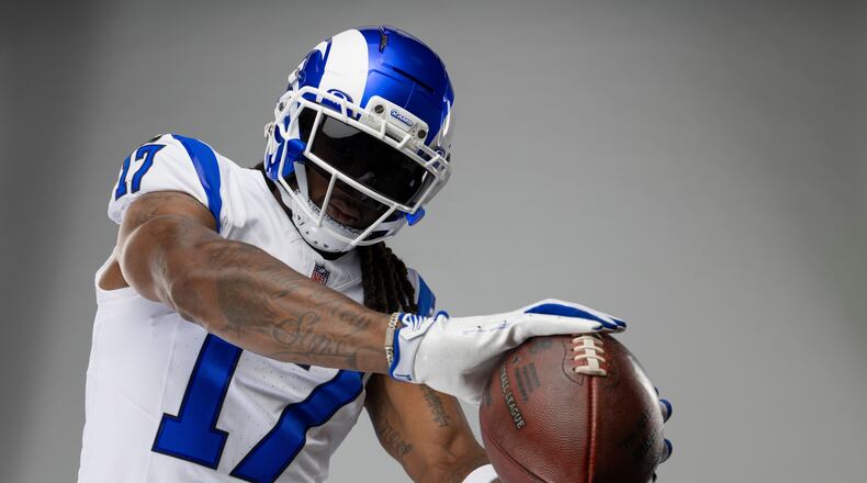 This undated photo provided by the Los Angeles Rams, Thursday, July 23, 2026, shows wide receiver Davante Adams posing in Los Angeles while wearing the Rams’ new “Fearsome White” alternate uniform. (Brevin Townsell/Los Angeles Rams via AP)