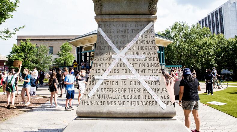 Protests continue in Decatur where large groups gathered, marched around Decatur Square and settled on the plaza.