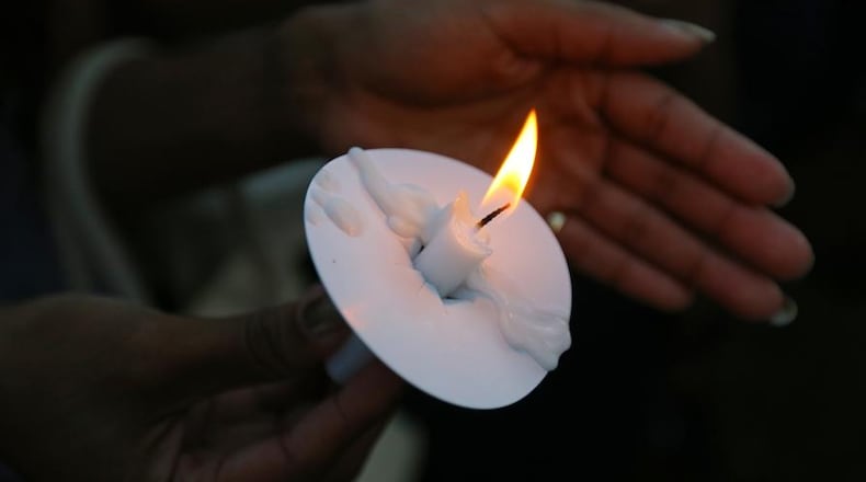 Cobb County will hold its annual candlelight vigil on Nov. 19 for those who wish to remember their loved ones who were victims of homicide. AJC file photo