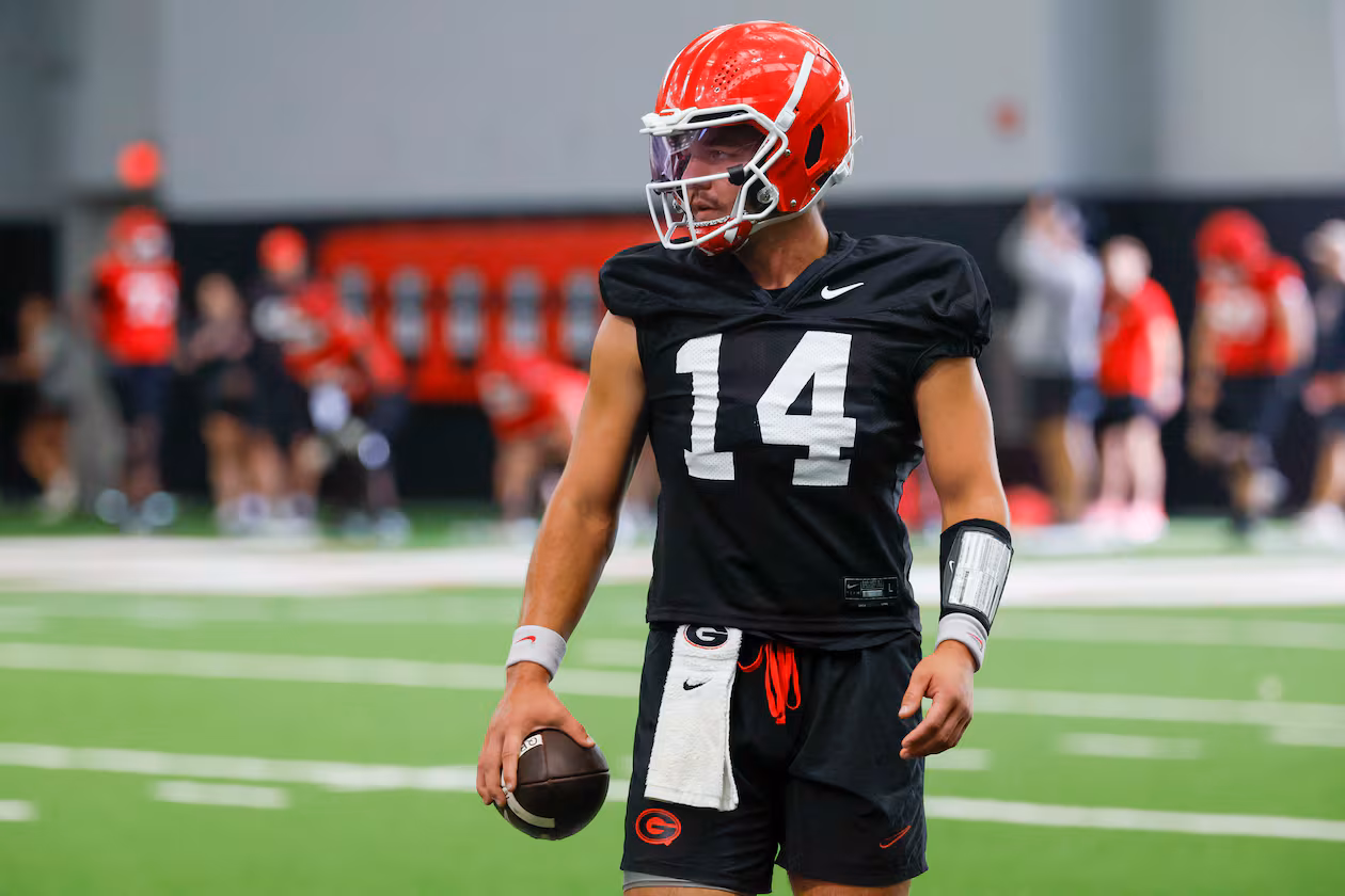 Georgia quarterback Gunner Stockton holds the ball during their first football practice at the University of Georgia practice facility, Wednesday, August 5, 2026, in Athens, Ga. (Miguel Martinez/AJC)