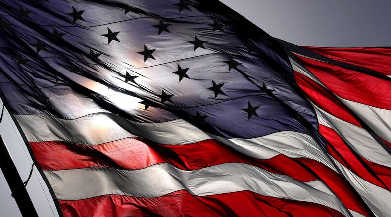 Many residents were upset with the cancellation of Creswell's July Fourth parade and decided to host their own unauthorized parade, organized by members from far-right extremist groups including the Proud Boys. (Joe Burbank/Orlando Sentinel/TNS)