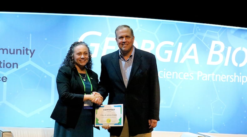 Maria Thacker-Goethe, President and CEO of Georgia Bio and John Bradberry, Mayor of Johns Creek at the 2023 Georgia Life Sciences Summit organized by Georgia Bio Nov. 8. 2023. (Courtesy City of Johns Creek)