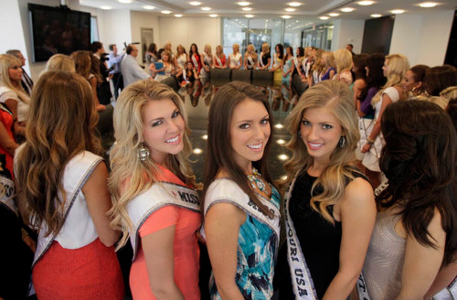 Donald Trump greets Miss USA 2011 contestants