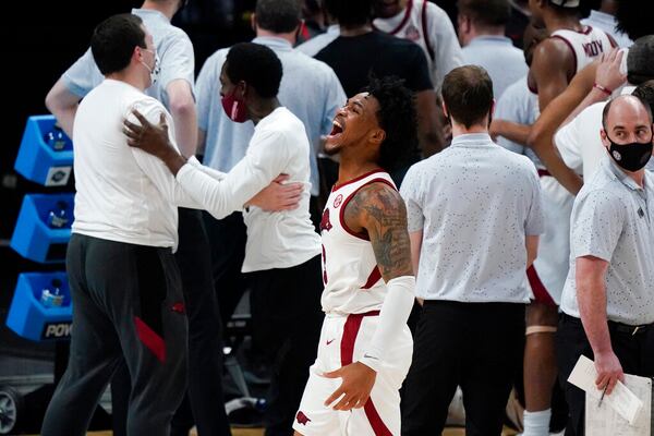 Arkansas guard Desi Sills celebrates after a Sweet 16 game against Oral Roberts in the NCAA men's college basketball tournament at Bankers Life Fieldhouse, Saturday, March 27, 2021, in Indianapolis. Arkansas won 72-70. (AP Photo/Jeff Roberson)