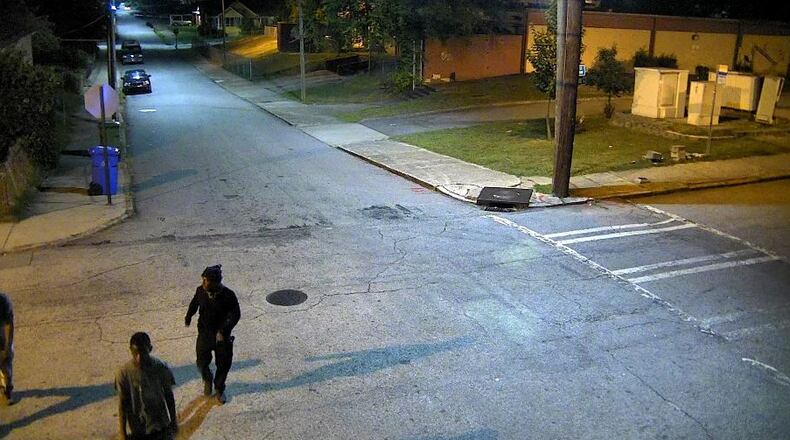 Police are seeking these men in connection with a shooting and robbery in July in northwest Atlanta. (Credit: Atlanta Police Department)