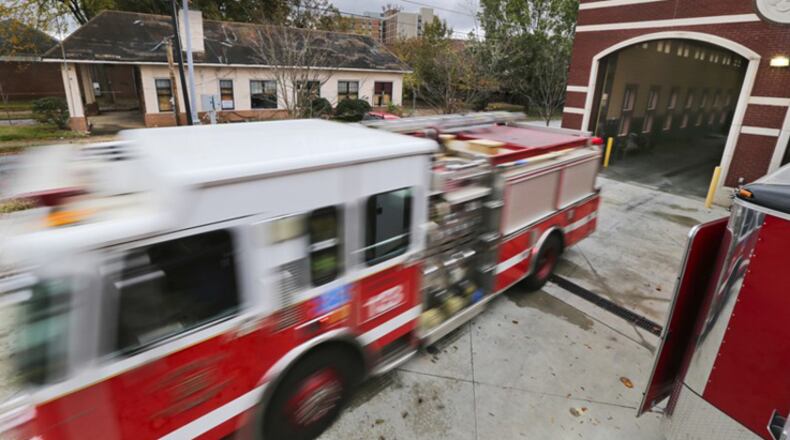 A Roswell Fire Department truck heads out on a call. Firefighters from 39 departments will train on rescue techniques this week at the Roswell-Alpharetta Public Safety Training Center. JOHN SPINK/JSPINK@AJC.COM