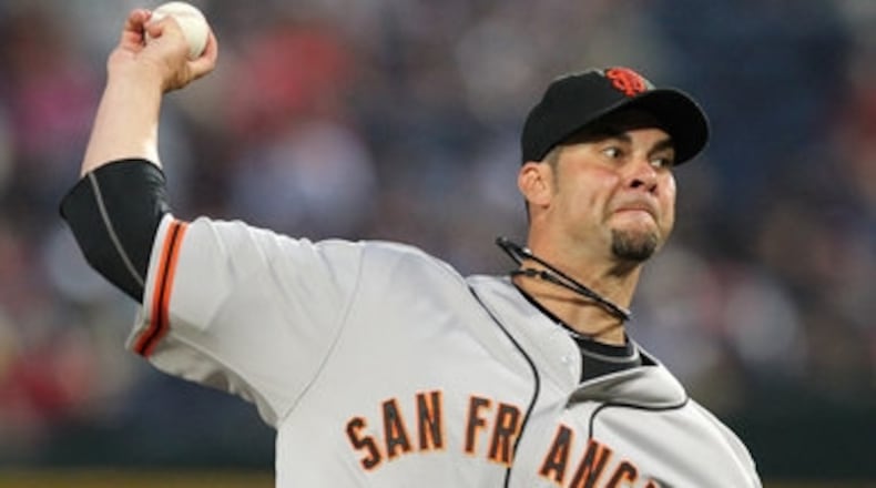 Giants pitcher Ryan Vogelsong delivers a pitch against the Braves during the 1st inning at Turner Field in Atlanta on Wednesday.