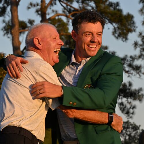 It took Rory McIlroy 17 years to win his first Green Jacket last year. It didn't take long to win No. 2, celebrating with his dad, Gerry McIlroy, Sunday in Augusta. (Hyosub Shin/AJC)