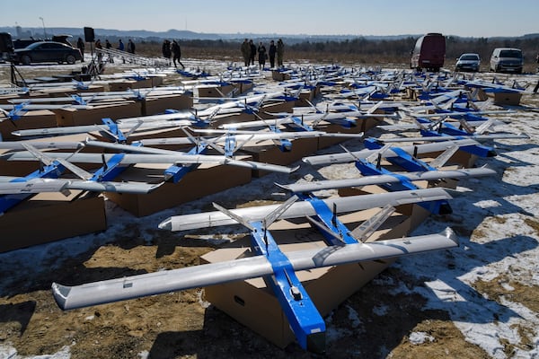 FILE - Ukrainian-made fixed-wing Besomar 3210 drone interceptors are handed over to the Armed Forces by Kozytskyi Charity Foundation in an undisclosed location in the Lviv region, western Ukraine, Friday, Feb. 21, 2025. (AP Photo/Mykola Tys, File)