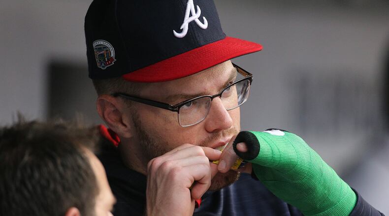 Braves slugger Freddie Freeman, whose broken wrist will keep him out of the All-Star Game, was third among leading vote-getters at first base in the initial fan voting update announced Tuesday. (Curtis Compton/AJC)