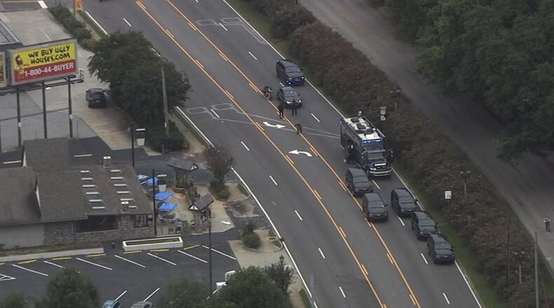 Four blocks of East College Avenue near the Twin Oaks Shopping Center have been blocked while authorities conduct a suspicious device investigation. (Credit: Channel 2 Action News)