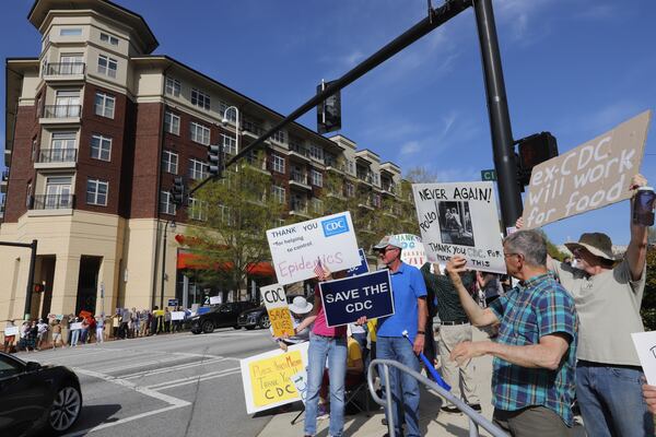 Demonstrators show support for Centers for Disease Control and Prevention employees on Tuesday, April 1, 2025, after federal cuts triggered significant layoffs in Atlanta. (Jenni Girtman for the AJC)
