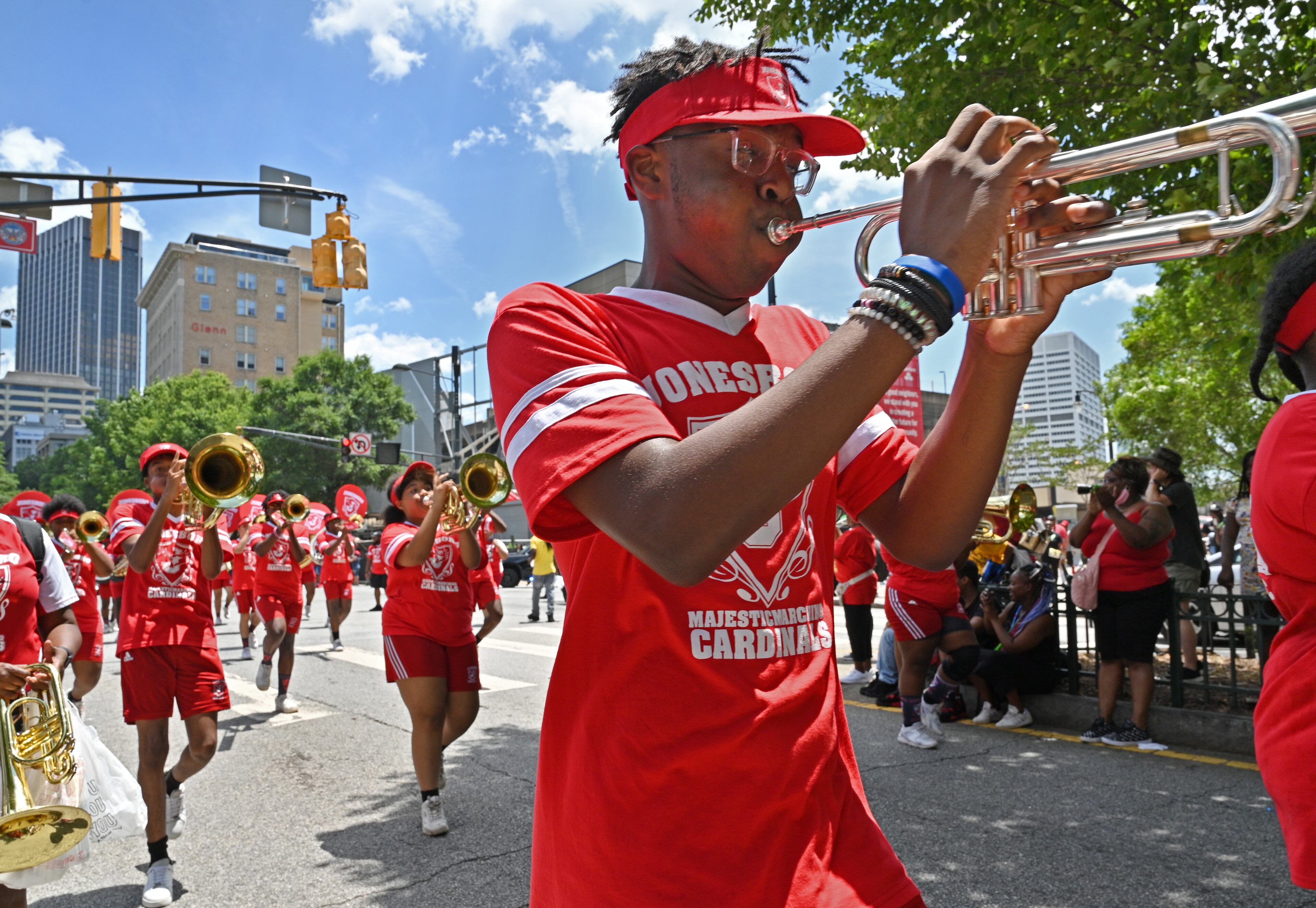 Watch the annual Juneteenth Atlanta Parade march through downtown Atlanta to Piedmont Park on Saturday, then stay for live music, cultural activities and more. (2022 photo by Hyosub Shin/AJC)