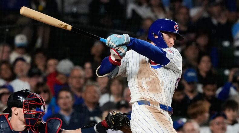 Chicago Cubs' Pete Crow-Armstrong hits a two-run home run during the sixth inning of a baseball game against the Atlanta Braves in Chicago, Monday, Sept. 14, 2026. (AP Photo/Nam Y. Huh)