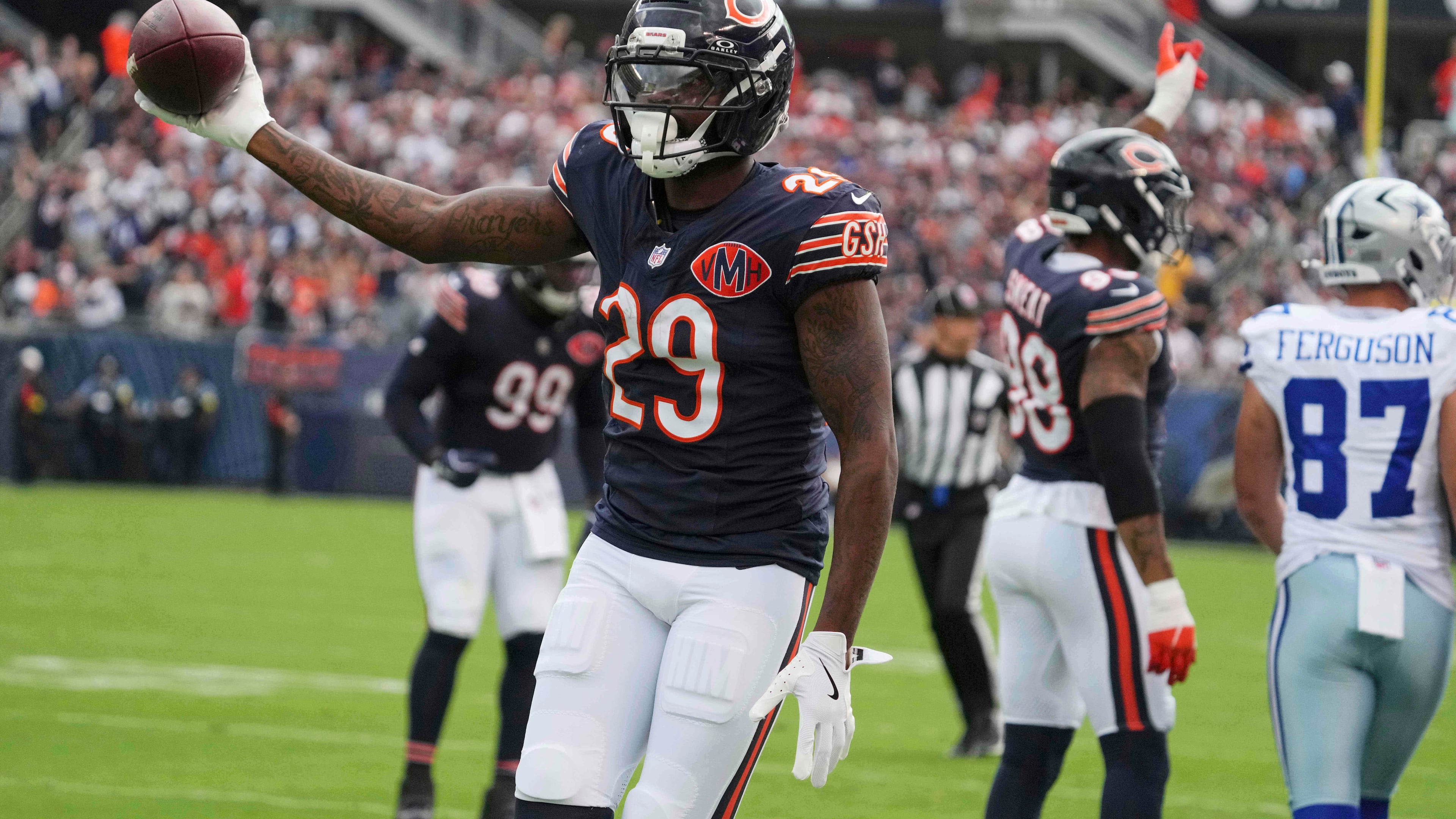 Chicago Bears cornerback Tyrique Stevenson (29) celebrates after stripping the ball away from Dallas Cowboys running back Javonte Williams in the first half of an NFL football game Sunday, Sept. 21, 2025, in Chicago. (AP Photo/Nam Y. Huh)