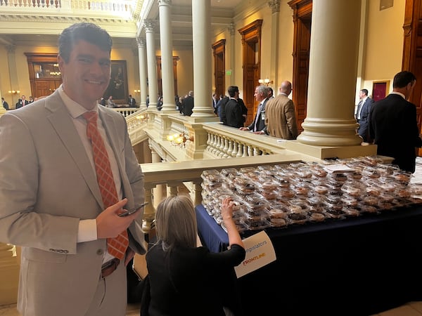 Cole Muzio of Frontline Policy Council handed out doughnuts to lawmakers at the Capitol in 2023.