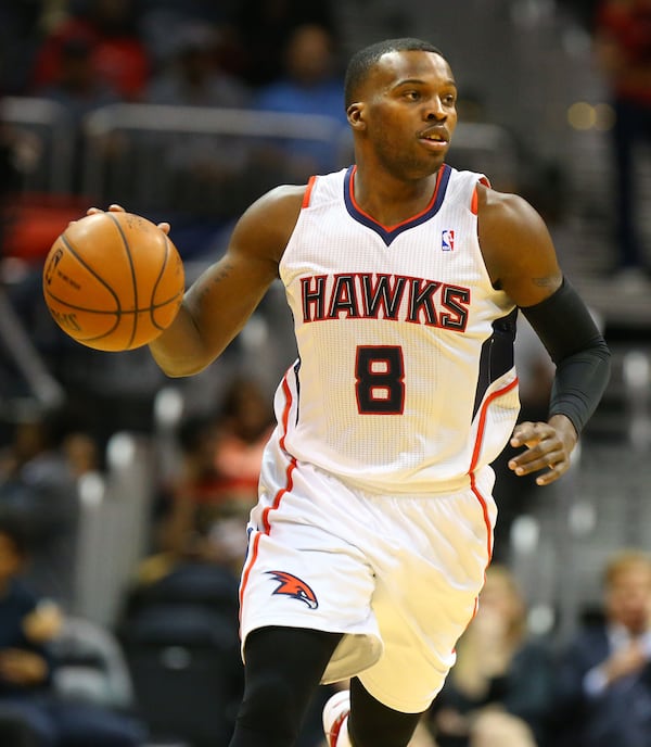 033114 ATLANTA: Hawks guard Shelvin Mack drives against the Sixers during the first half of an NBA basketball game on Monday, March 31, 2014, in Atlanta. CURTIS COMPTON / CCOMPTON@AJC.COM