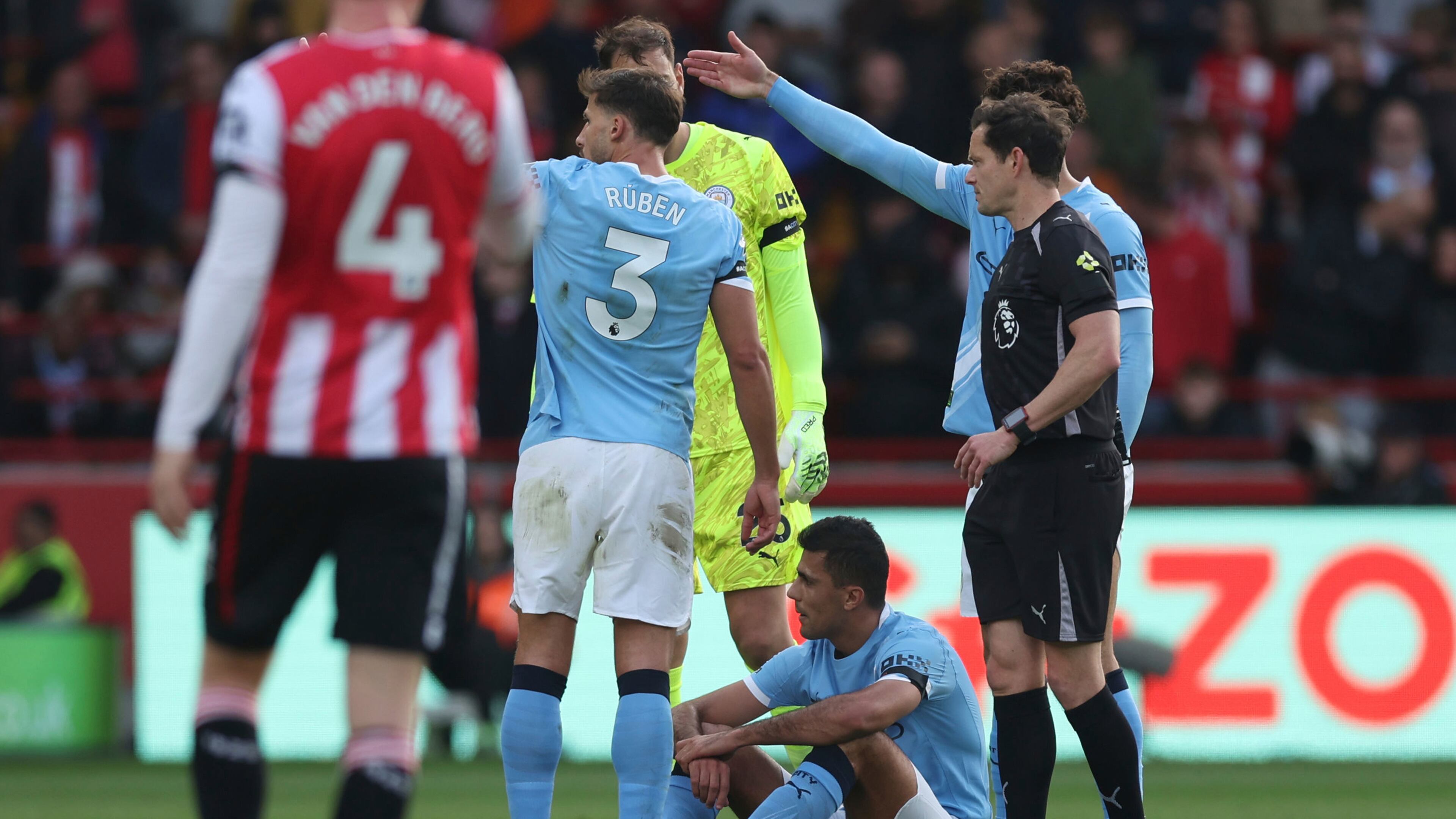 Manchester City's Rodri on the floor, before being taken off as injured, during the English Premier League soccer match between Brentford and Manchester City at the Gtech Community Stadium, Brentford, England, Sunday Oct. 5, 2025. (Steven Paston/PA via AP)