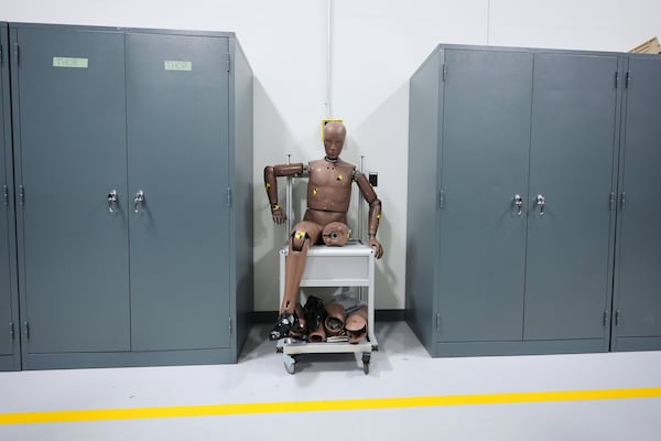 A Hybrid III 50th male crash test dummy is shown at Humanetics in Farmington Hills, Mich., Tuesday, June 10, 2025. (AP Photo/Paul Sancya)
