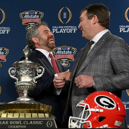 Georgia head coach Kirby Smart and Ole Miss head coach Pete Golding interact at a press conference ahead of the Sugar Bowl on Wednesday, Dec. 31, 2025, in New Orleans. (Hyosub Shin/AJC)