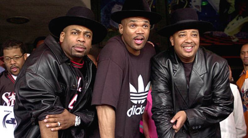 Rock & Roll Hall of Fame inductees (from left) Jason "Jam-Master Jay" Mizell, Darryl "DMC" McDaniels and Joseph "Reverend Run" Simmons of Run-DMC took hip-hop from the streets to the national stage. Rolling Stone named them one of the greatest musical artists of all time. (AP file)