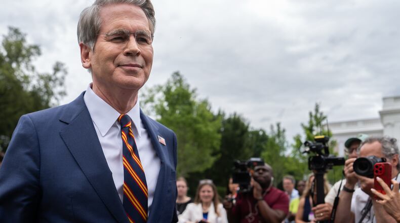Treasury Secretary Scott Bessent walks past reporters following an interview with Fox News outside the White House, Thursday, July 30, 2026, in Washington. (AP Photo/Julia Demaree Nikhinson)