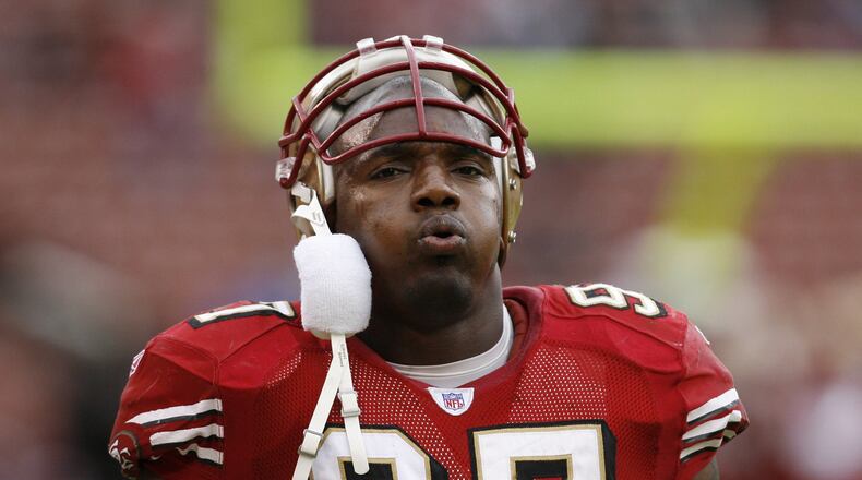 49ers defensive end Bryant Young on the sidelines as the San Francisco 49ers defeated the Houston Texans in overtime by a score of 20 to 17 at Monster Park, San Francisco, California, January 1, 2006. (Photo by Robert B. Stanton/NFLPhotoLibrary)