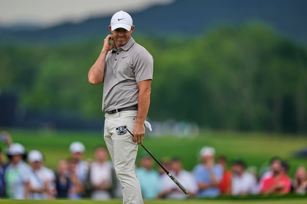 Rory McIlroy, of Northern Ireland, reacts after missing a putt on the ninth hole during the third round of the U.S. Open golf tournament at Oakmont Country Club Saturday, June 14, 2025, in Oakmont, Pa. (AP Photo/Charlie Riedel)
