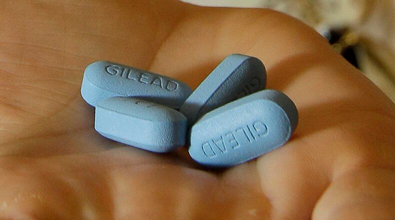 An Atlanta AIDS group joined a multi-state effort Tuesday to reduce the costs of HIV drugs by insurance firms, asserting that the high prices discriminate against people living with the disease.