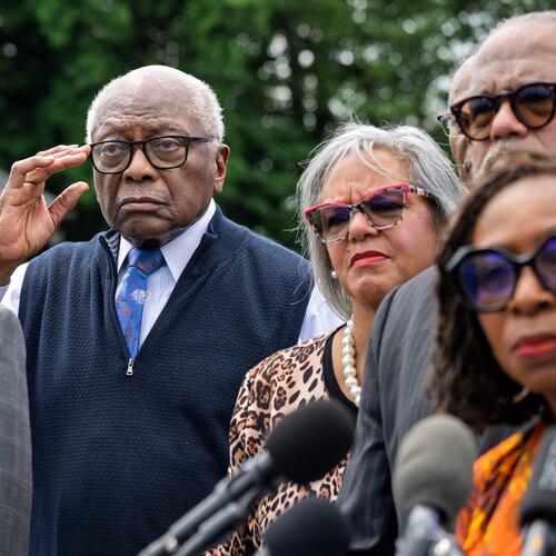 Rep. Jim Clyburn, D-S.C., center, joined by House Minority Leader Hakeem Jeffries, D-N.Y., left, stands with members of the Congressional Black Caucus during an event outside the Capitol in Washington, Tuesday, May 19, 2026. (AP Photo/J. Scott Applewhite)