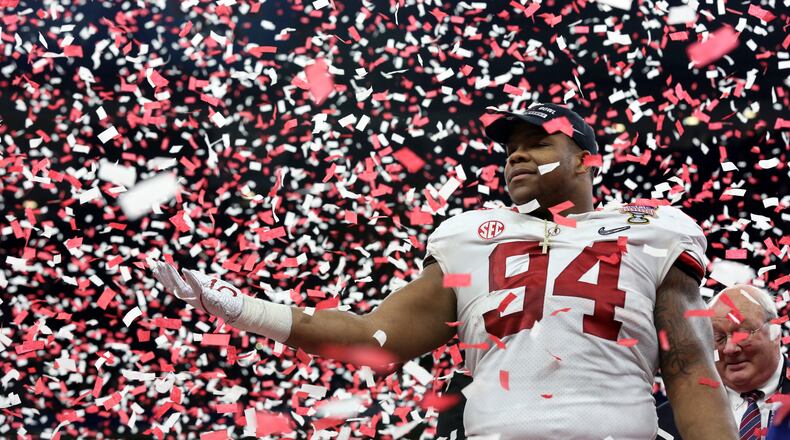 Alabama defensive lineman Da'Ron Payne (94) celebrates after being selected most valuable defensive player, after the Sugar Bowl semi-final playoff game against Clemson for the NCAA college football national championship, in New Orleans, Monday, Jan. 1, 2018. Alabama won 24-6 to advance to the national championship game. (AP Photo/Rusty Costanza)