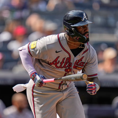 Atlanta Braves' Michael Harris II watches his RBI single during the 10th inning of a baseball game against the New York Yankees, Sunday, Aug. 9, 2026, in New York. (AP Photo/Seth Wenig)