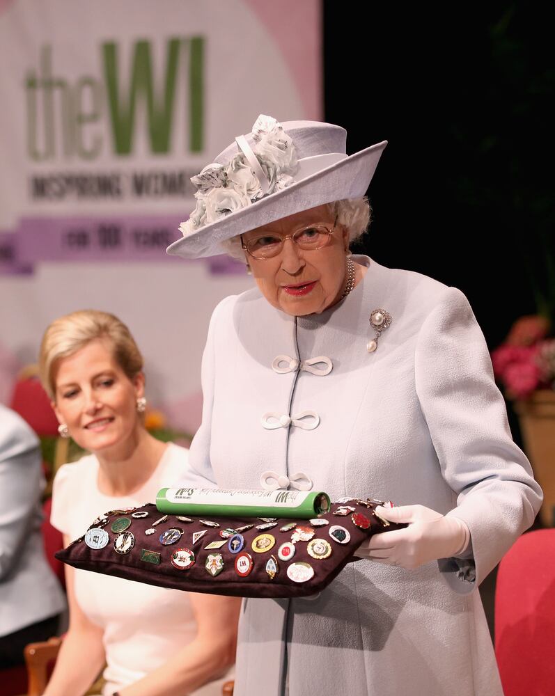 Queen Elizabeth presents the Centenary Women's Institute 'baton'