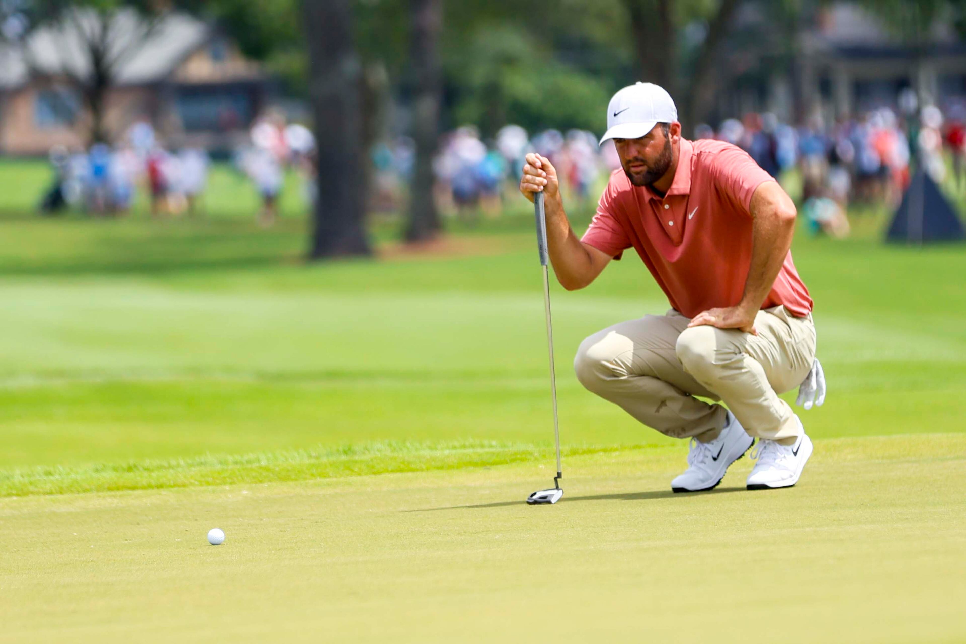 Scottie Scheffler prepares to putt on the second hole during the first round of the PGA Tour Championship at East Lake Golf Club on Thursday, Aug. 21, 2025, in Atlanta. (Miguel Martinez/ AJC)