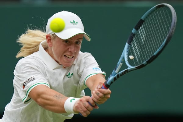 Sonay Kartal of Britain returns to Russia's Anastasia Pavlyuchenkova during a fourth round women's singles match at the Wimbledon Tennis Championships in London, Sunday, July 6, 2025. (AP Photo/Alastair Grant)