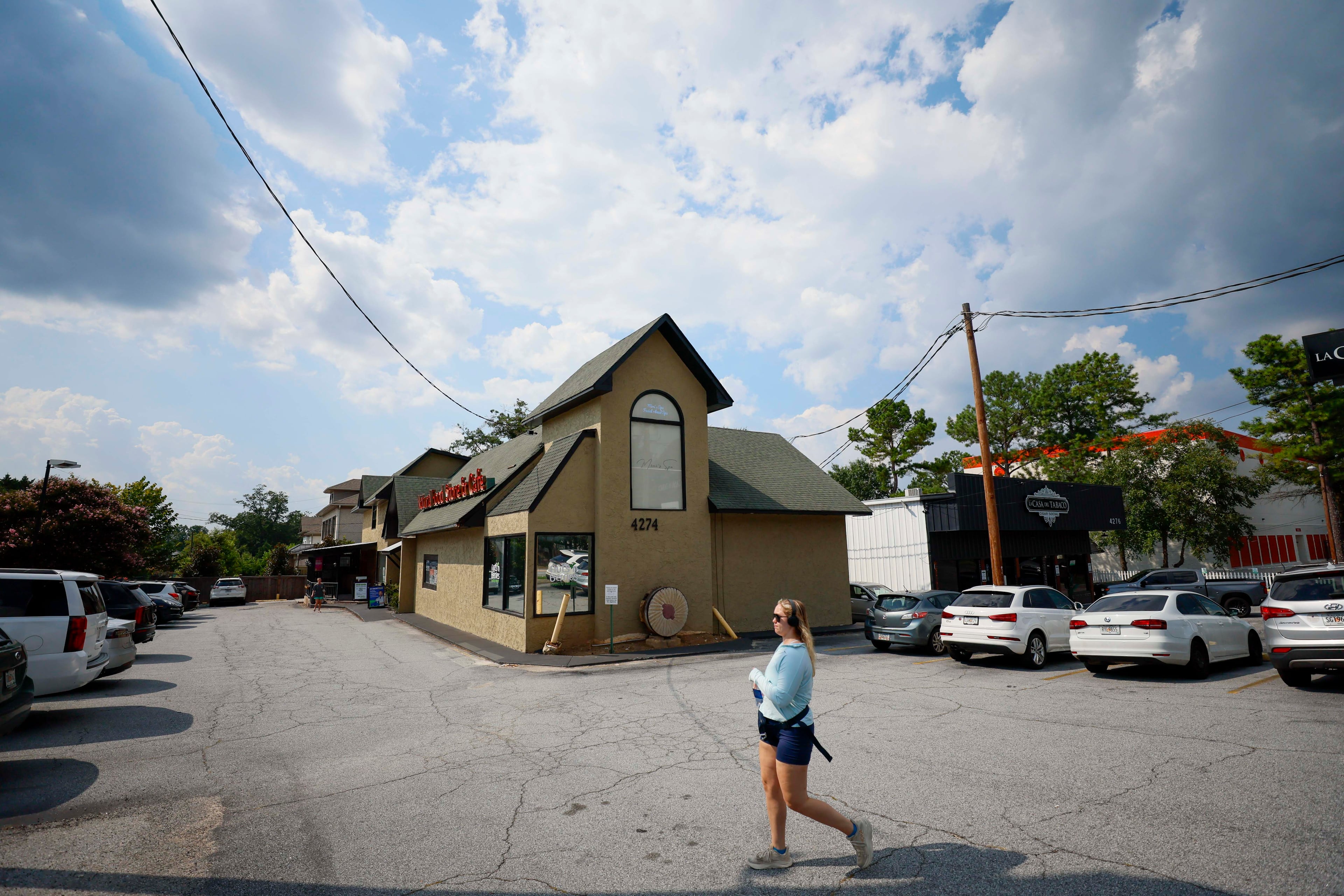 This Brookhaven building,which houses a natural food store, was sold to Sergey Khotimskiy for $1.7 million in 2016. "It was like a ghost in the night," said the seller. "The money was good and in the account, and the property transferred very quickly." (Miguel Martinez/AJC)