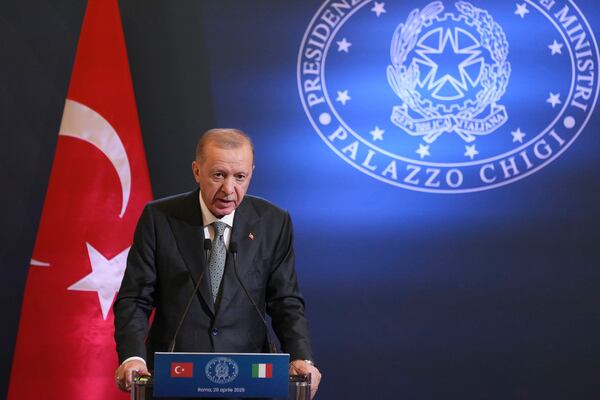 Turkish President Recep Tayyip Erdogan speaks during a joint press conference with Italian Premier Giorgia Meloni, at Villa Pamphilj in Rome, Tuesday, April 29, 2025. (AP Photo/Francisco Seco)
