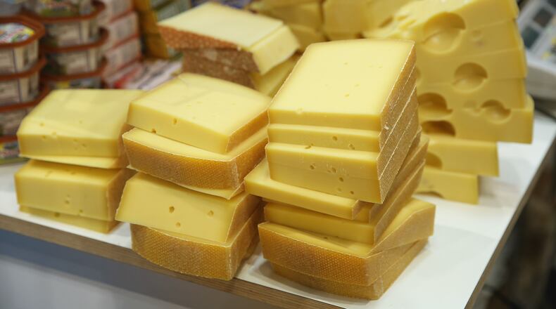 BERLIN, GERMANY - JANUARY 16: Alpine mountain cheese awaits visitors at a stand at the International Green Week agricultural trade fair (Internationale Gruene Woche) on January 16, 2015 in Berlin, Germany. The International Green Week is the world's largest agricultural trade fair and is open to the public from January 16-25. (Photo by Sean Gallup/Getty Images)
