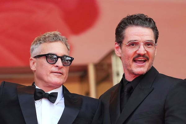 Joaquin Phoenix, left, and Pedro Pascal pose for photographers upon arrival at the premiere of the film 'Eddington' at the 78th international film festival, Cannes, southern France, Friday, May 16, 2025. (Photo by Scott A Garfitt/Invision/AP)