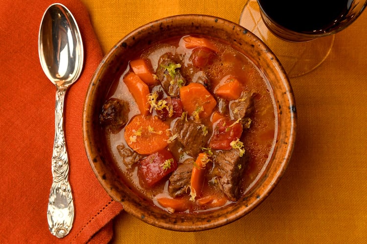"Fricton maxx" this snowy weekend by spending extra time in the kitchen. Make this Lemon-Lime Beef and Carrot Stew. (Chris Hunt for the AJC)